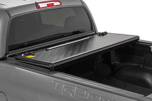 Rough Country 47414551 Low Profile Tri Fold Aluminum Tonneau Cover for 2007-2021 Toyota Tundra (5' 7" Bed) - Recon Recovery