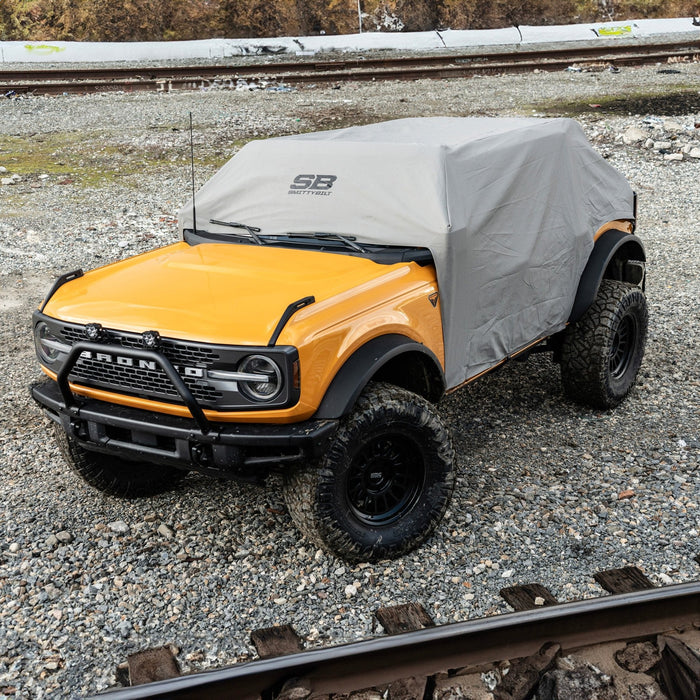 Protect your Bronco with the Smittybilt Climate Cab Cover. Breathable, UV - resistant, water - repellent cover designed for 2021+ Ford Bronco 4 - Door. - Recon Recovery