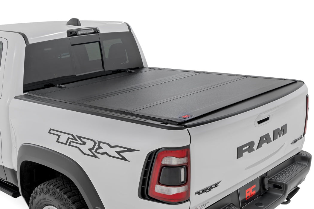 Rough Country Hard Tri - Fold Flip Up Bed Cover for 2021 - 2024 Ram 1500 & 1500 TRX - Recon Recovery