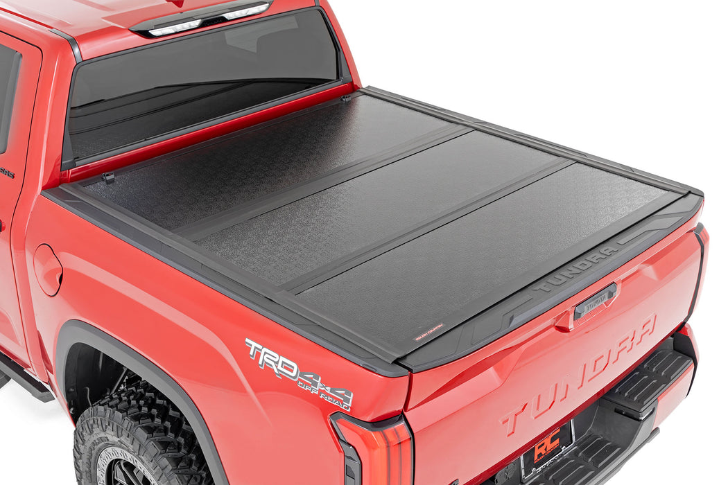 Rough Country 47514551A Low Profile Tri Fold Aluminum Tonneau Cover for 2022-2024 Toyota Tundra (5' 7" Bed)