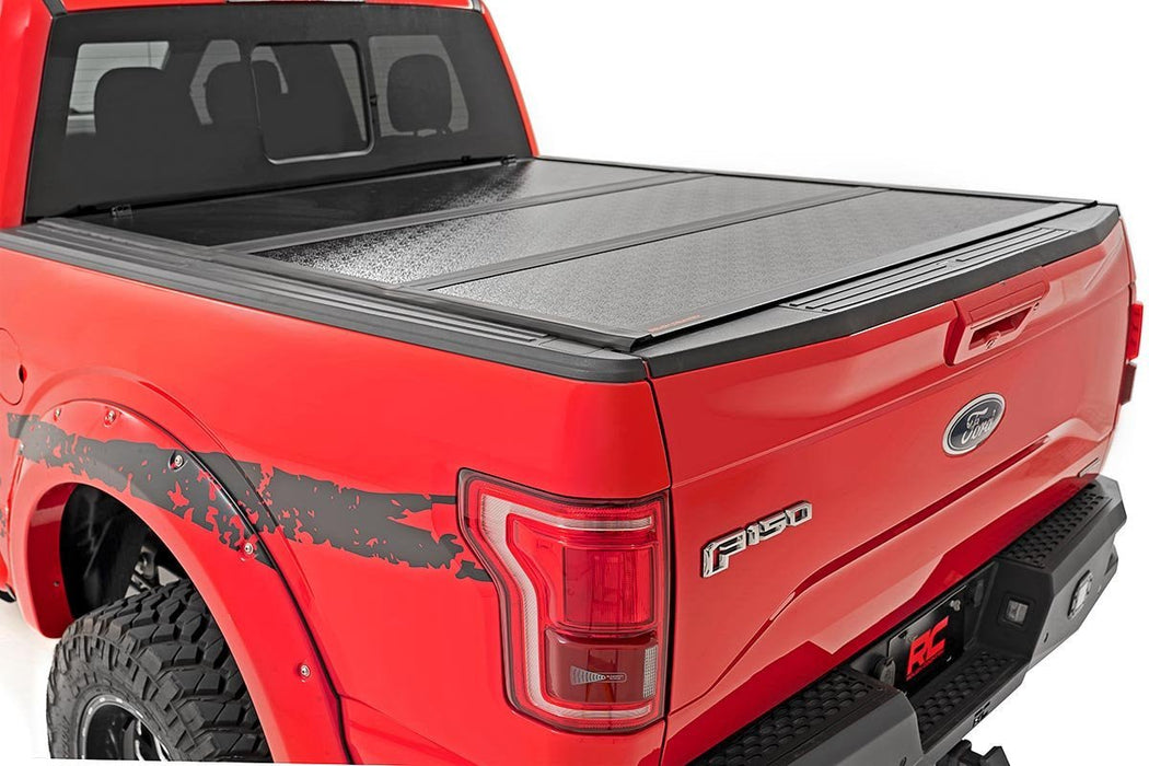 Rough Country 47220550A Low Profile Tri Fold Aluminum Tonneau Cover for 2015-2020 Ford Raptor (5' 7" Bed) - Recon Recovery